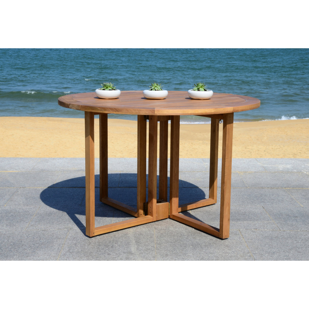 SAFAVIEH Outdoor Collection Wales Round 47.24 Inch Diameter Dining Table Natural Image 1