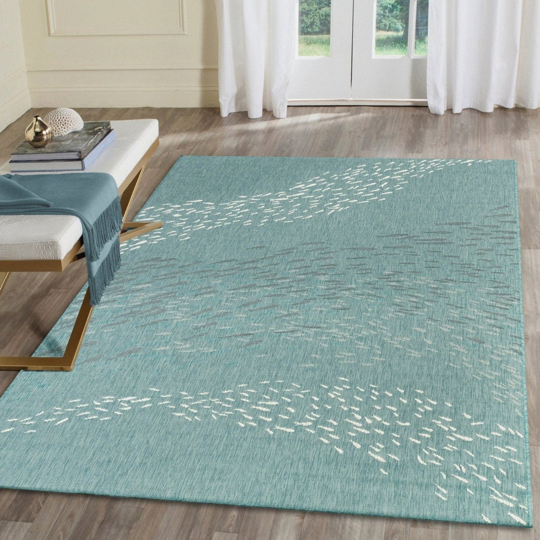 Liora Manne Carmel School of Fish Indoor Outdoor Area Rug Aqua 100% Polypropylene Image 1