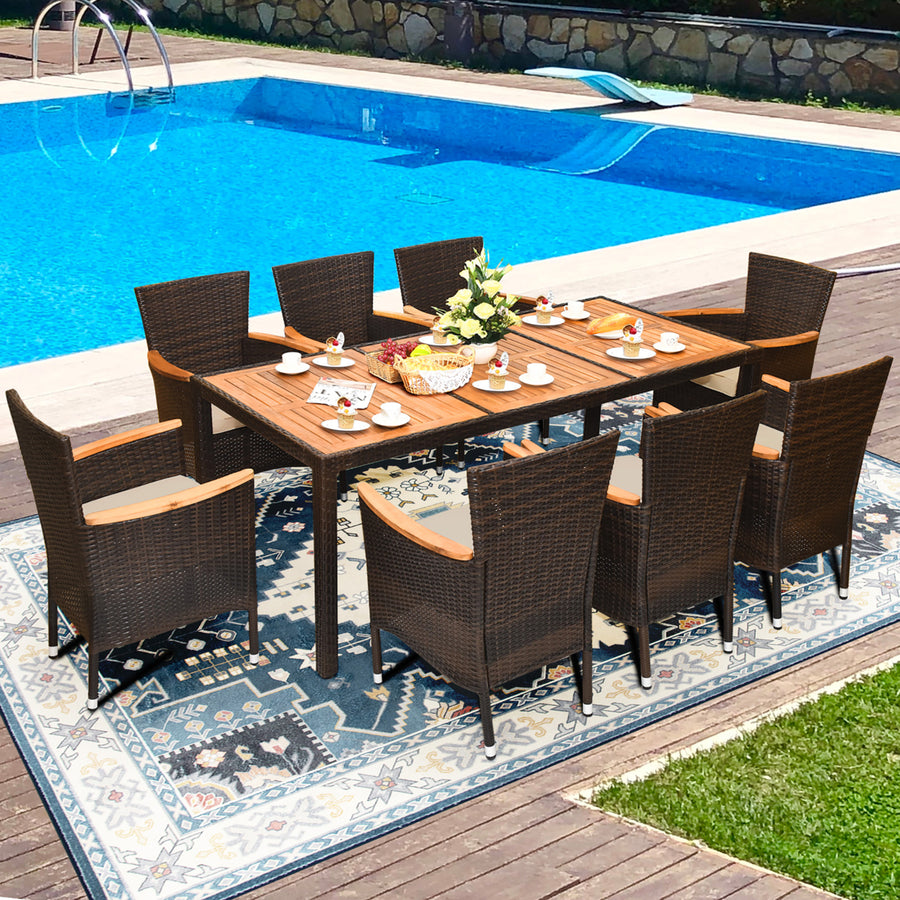 9PCS Rattan Patio Dining Set w/ 8 Stackable Cushioned Chairs Wooden Tabletop Image 1