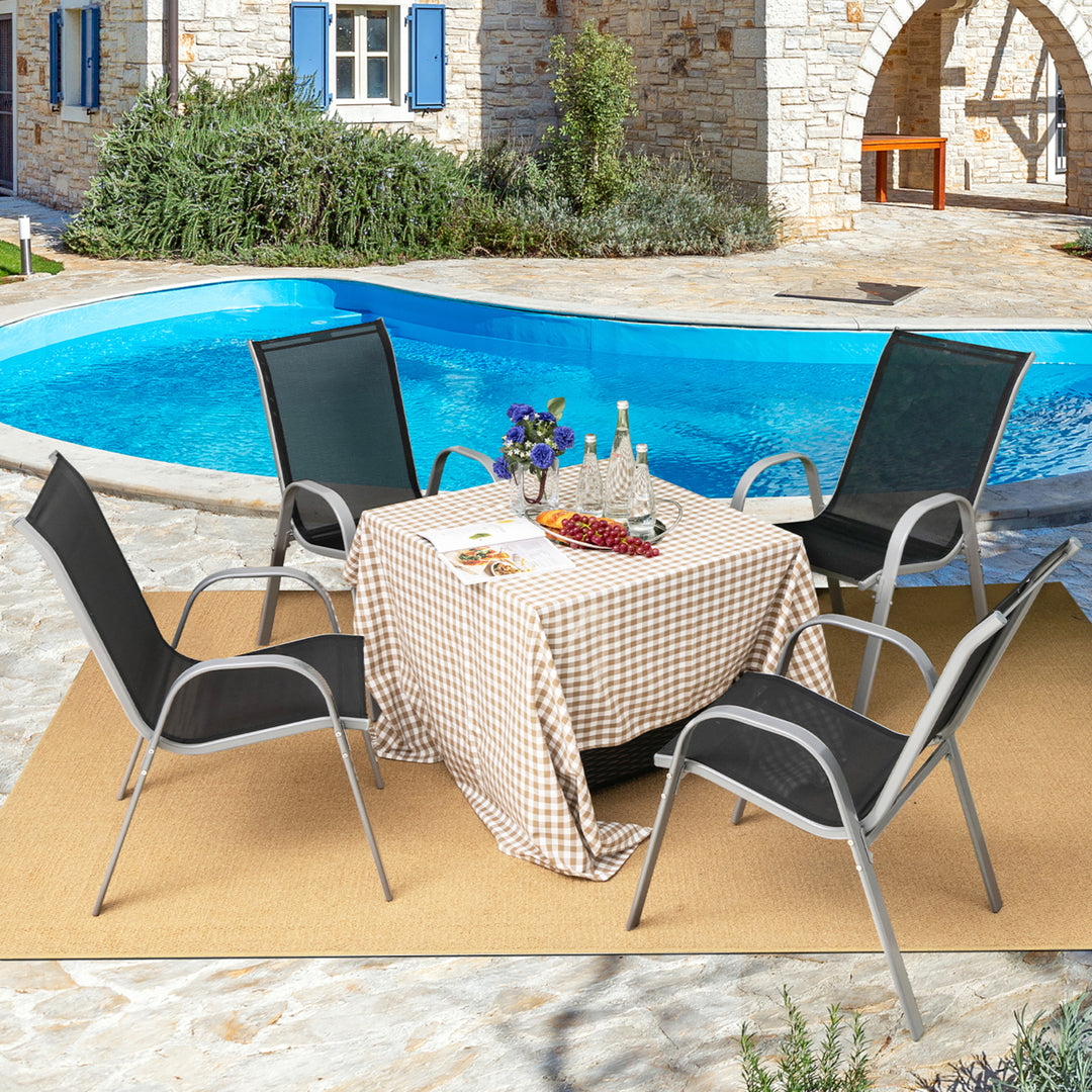 4PCS Patio Stacking Dining Chairs w/ Curved Armrests and Breathable Seat Fabric Image 1