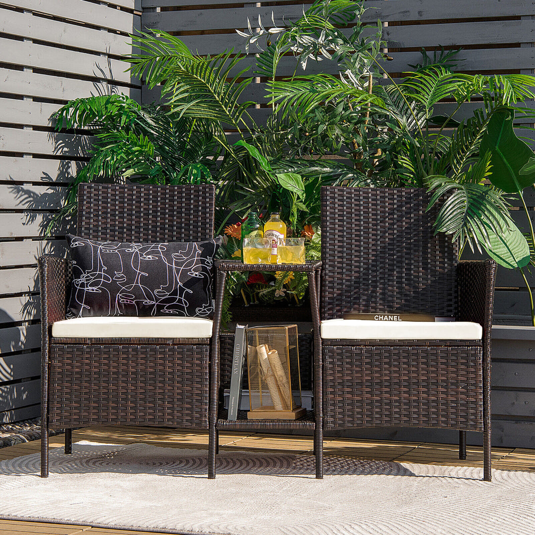 Patio Rattan Conversation Furniture Set w/ Loveseat Glass Coffee Table and Cushions Image 1