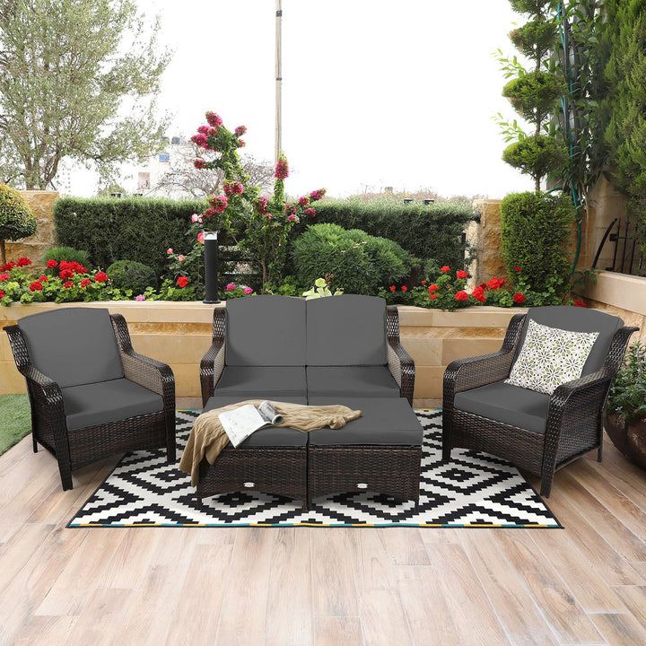 Costway 5PCS Patio Rattan Furniture Set Loveseat Sofa Ottoman W/Red\White Cushion Image 1