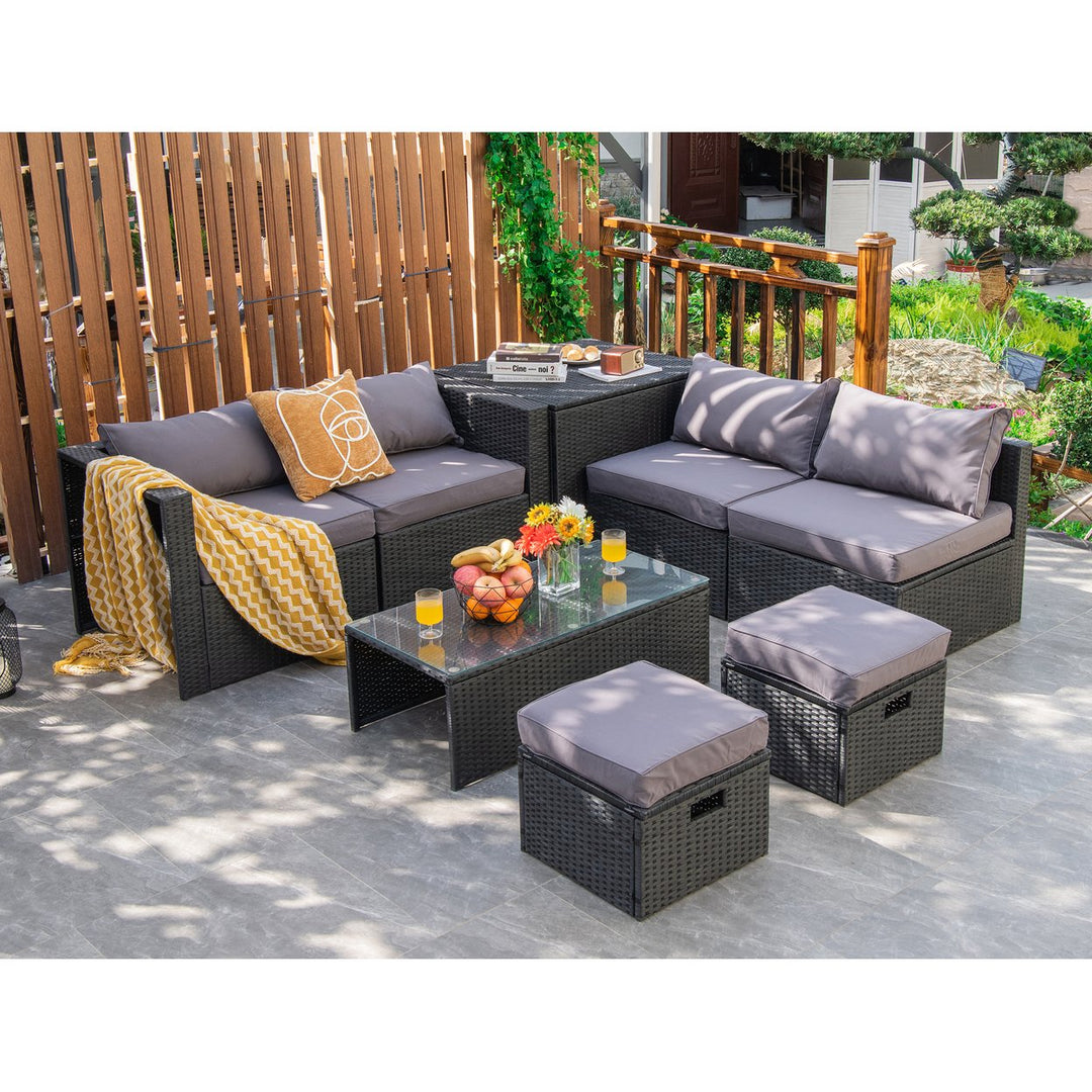 Costway 8PCS Patio Rattan Furniture Set Storage Table Ottoman cover Image 1