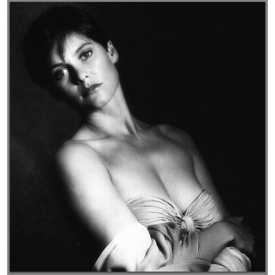 Carey Lowell - strapless top Photo Print (8 x 10) - Item DAP14165 Image 1