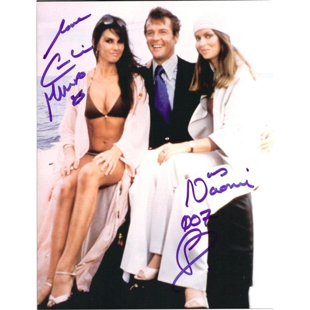 Caroline Munro - sitting on Roger Moores lap Photo Print (8 x 10) - Item DAP14700 Image 1