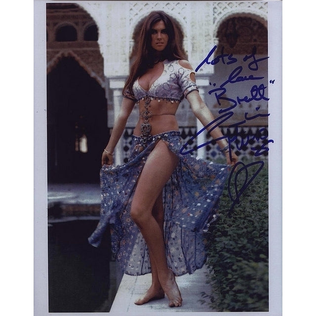 Caroline Munro - blue gypsy skirt with signature Photo Print (8 x 10) - Item DAP14701 Image 1