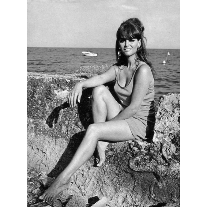 Claudia Cardinale - Rocks Photo Print (8 x 10) - Item DAP15321 Image 1