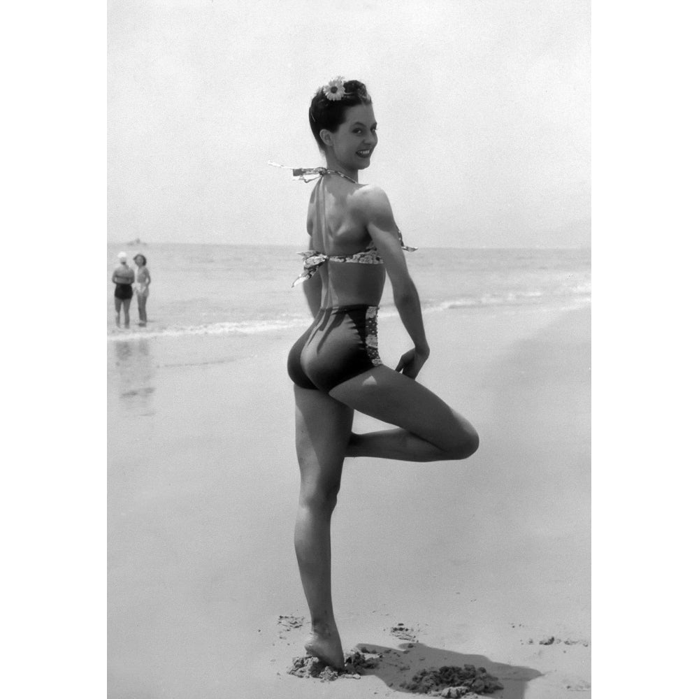 Cyd Charisse - one leg on beach Photo Print (8 x 10) - Item DAP15804 Image 1