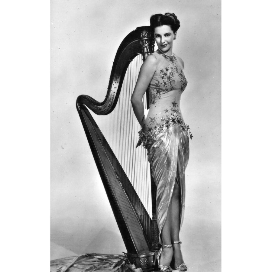 Cyd Charisse - harp Photo Print (8 x 10) - Item DAP15876 Image 1