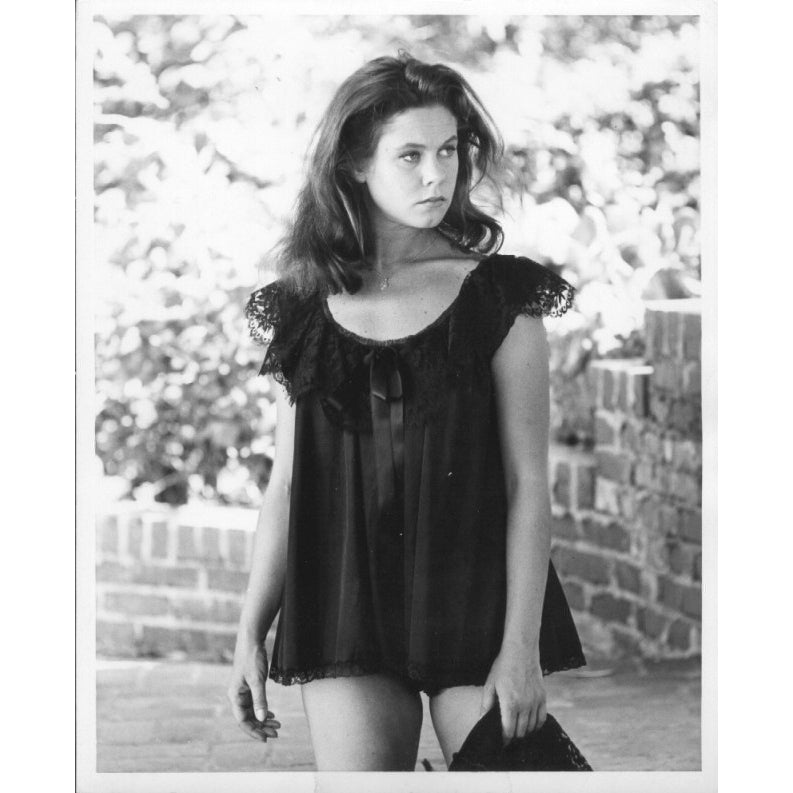 Elizabeth Montgomery - Black Mini DRess With Brick Background Photo Print (8 x 10) - Item DAP17639 Image 1