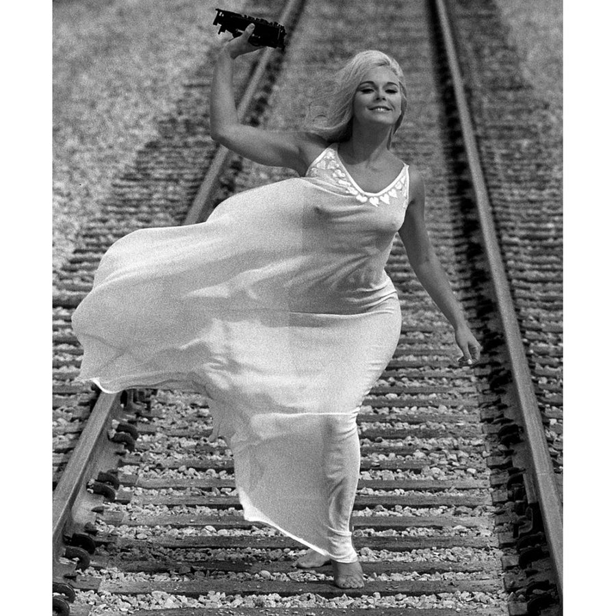 Elke Sommer - On Railroad Photo Print (8 x 10) - Item  DAP18025 Image 1