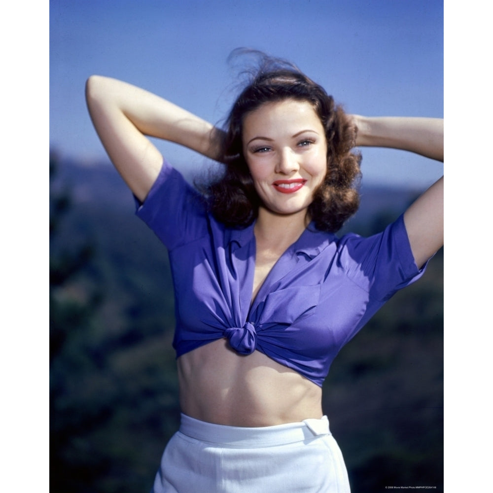 Gene Tierney - Hands Behind head in Tied Off Shirt Photo Print (8 x 10) - Item DAP18184 Image 1