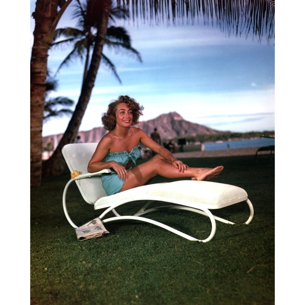 Joan Crawford - Sitting on Outdoor Lounger Photo Print (8 x 10) - Item DAP18714 Image 1