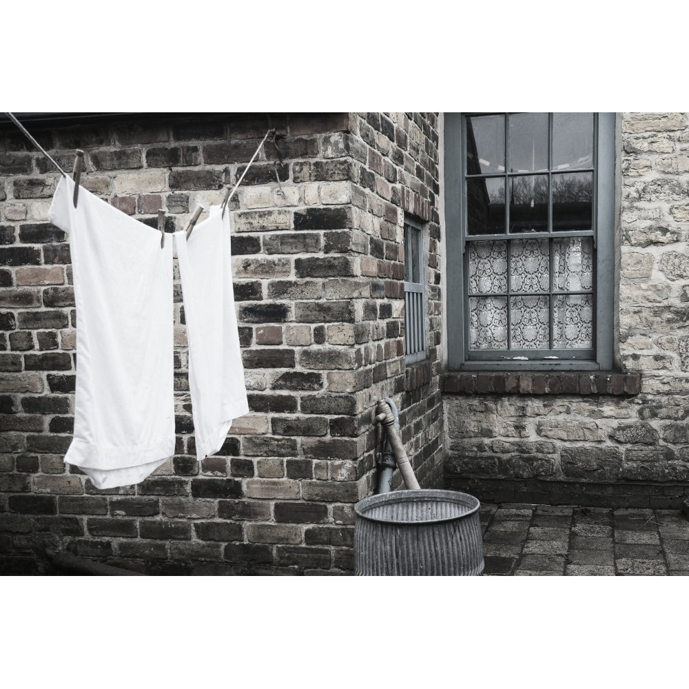 Stone walls of a house with laundry hanging to dry on the clothesline; Beamish Durham England Poster Print (8 x 10) Image 1