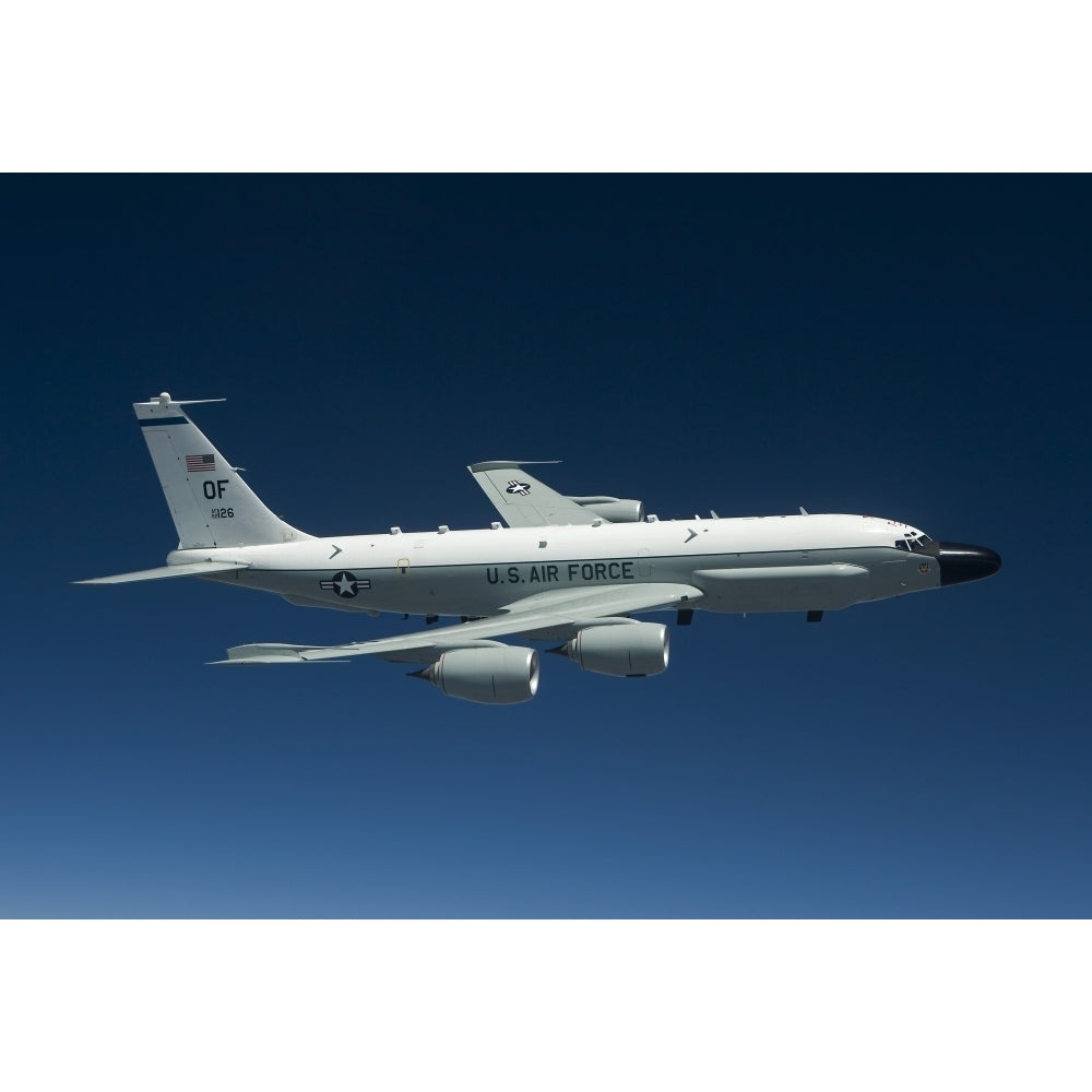 An RC-135W Rivet Joint aircraft flies over the Midwest Poster Print (8 x 10) Image 1