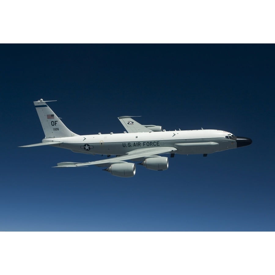 An RC-135W Rivet Joint aircraft flies over the Midwest Poster Print (8 x 10) Image 1