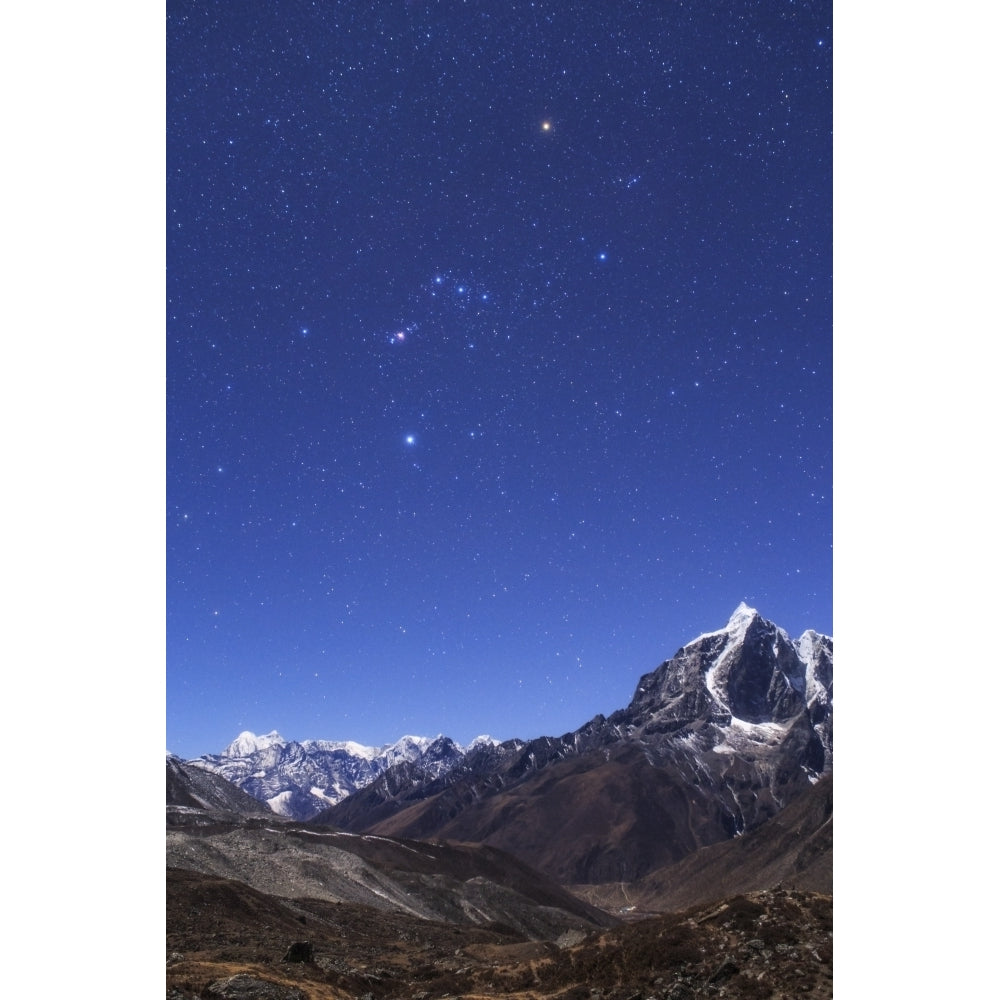 The Orion constellation above the moonlit landscape of the Himalayas in Nepal Poster Print (8 x 10) Image 1