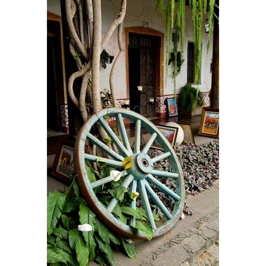 Wagon Wheel La Posada De Don Rodrigo Hotel Antigua Guatemala Print by Bill Bachmann Image 1