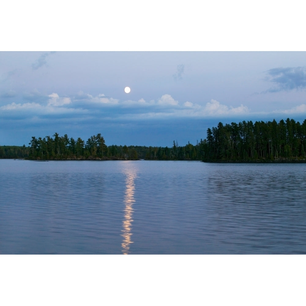 Moon rising over Lake One water reflection Boundary Waters Canoe Area Wilderness Minnesota USA. Poster (36 x 12) Image 1