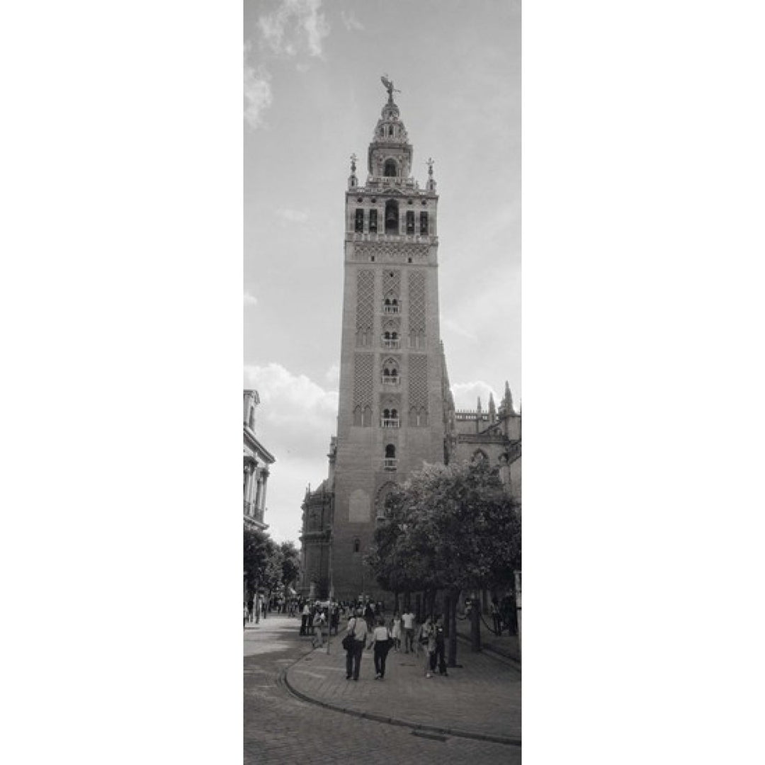 Group of people walking near a church La Giralda Seville Cathedral Seville Seville Province Andalusia Spain (36 x 13) Image 1