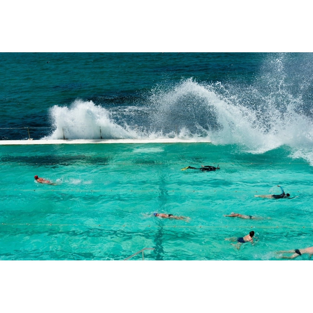 Waves breaking over edge of pool of Bondi Icebergs Swim Club Bondi Beach Sydney South Wales Australia (36 x 12) Image 1