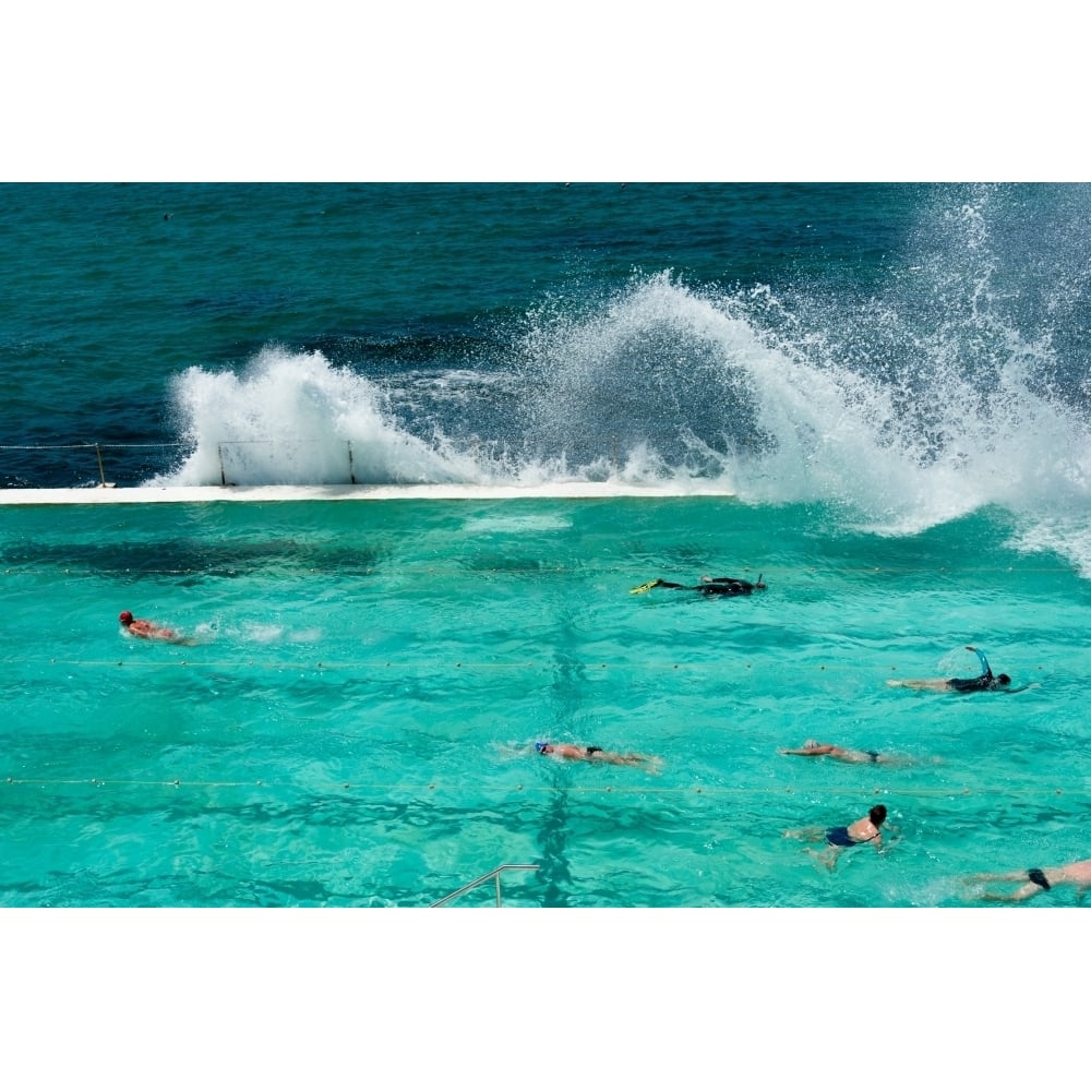 Waves breaking over edge of pool of Bondi Icebergs Swim Club Bondi Beach Sydney South Wales Australia (27 x 9) Image 1