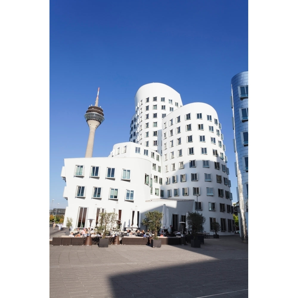 Neuer Zollhof buildings designed by Frank Gehry with Rheinturm Tower Media Image 1