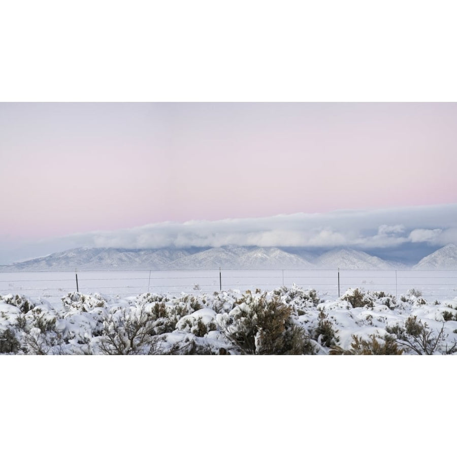 Sangre De Cristo Range with clouds and pink sky seen from NM highway 64 San Luis Valley Colorado USA Poster (12 x 7) Image 1