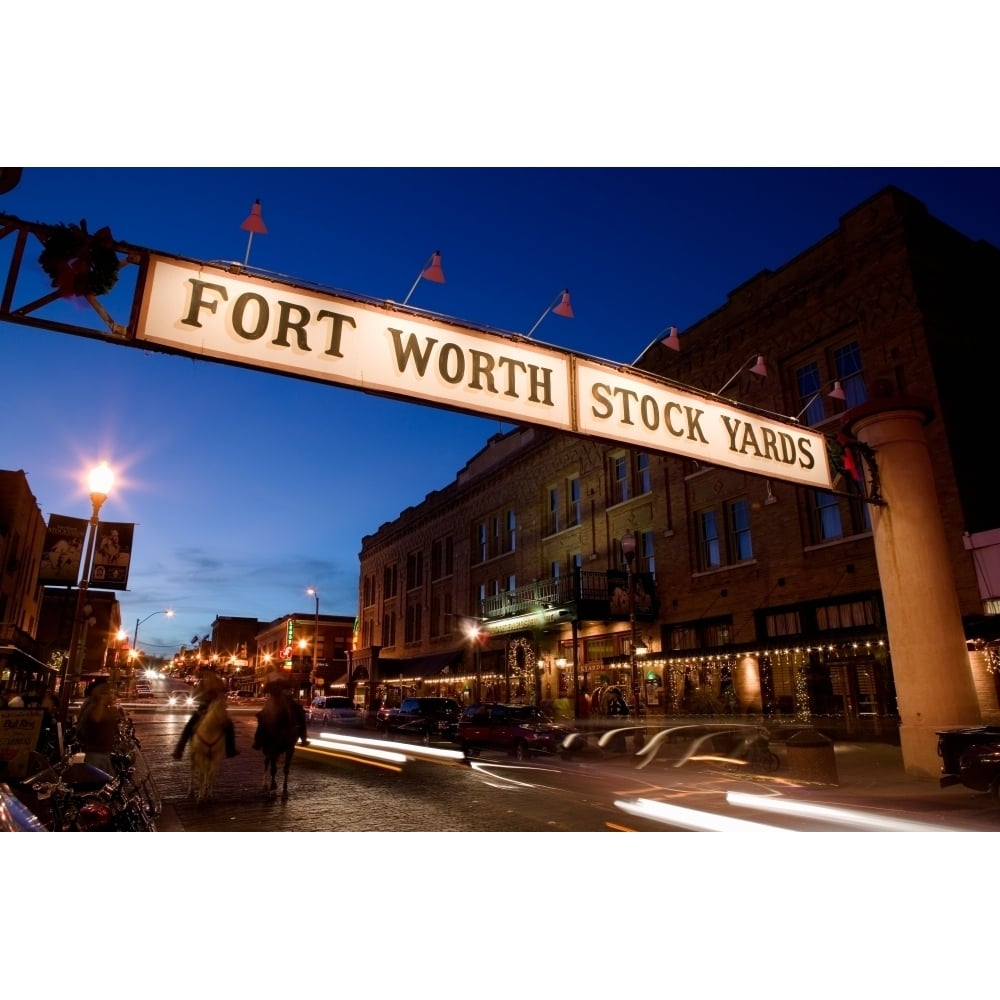 Signboard over a road at dusk Fort Worth Stockyards Fort Worth Texas USA Poster Print (27 x 9) Image 1