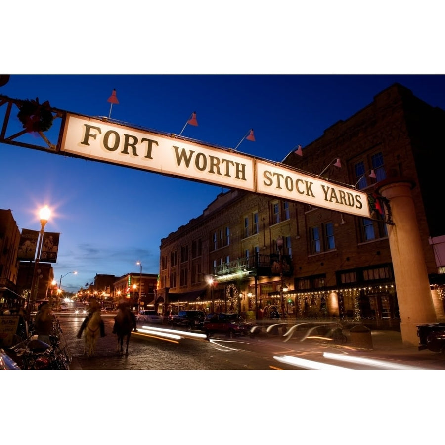 Signboard over a road at dusk Fort Worth Stockyards Fort Worth Texas USA Poster Print (27 x 9) Image 1