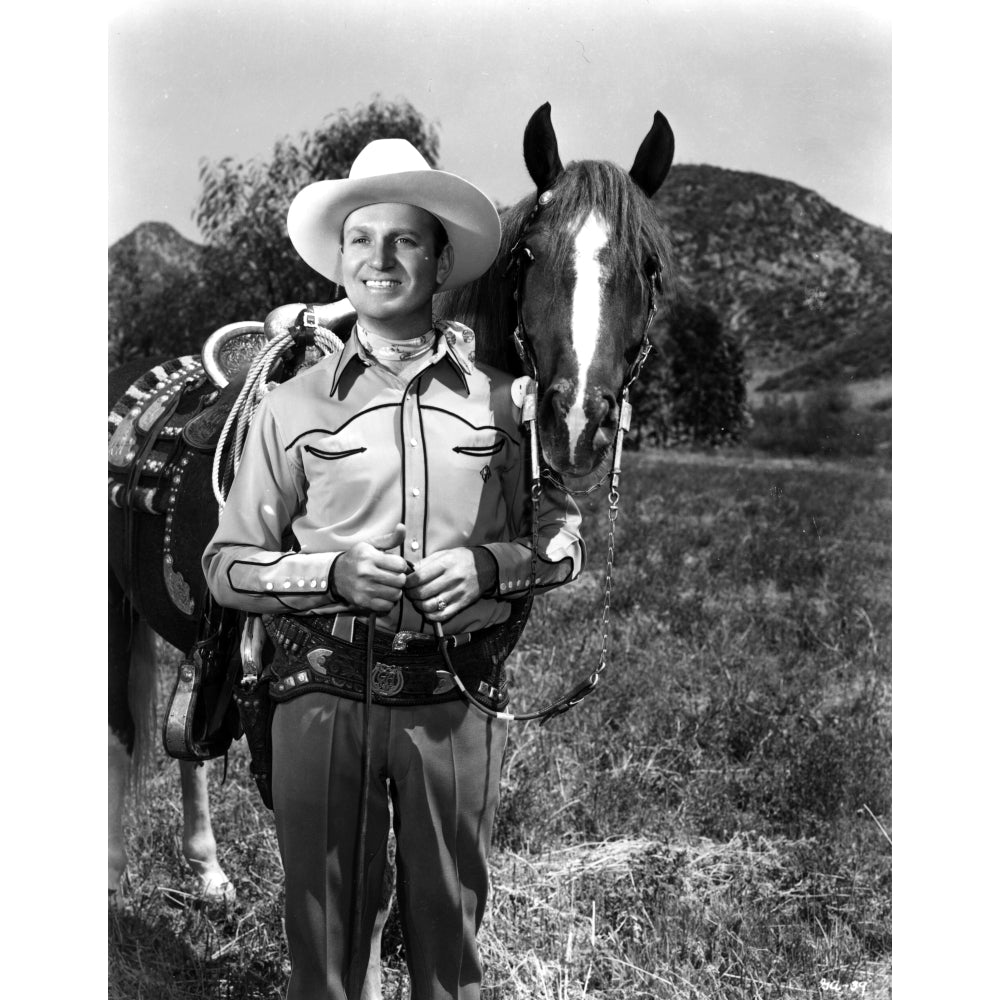 Gene Autry with a cowboy hat and horse Photo Print Image 1