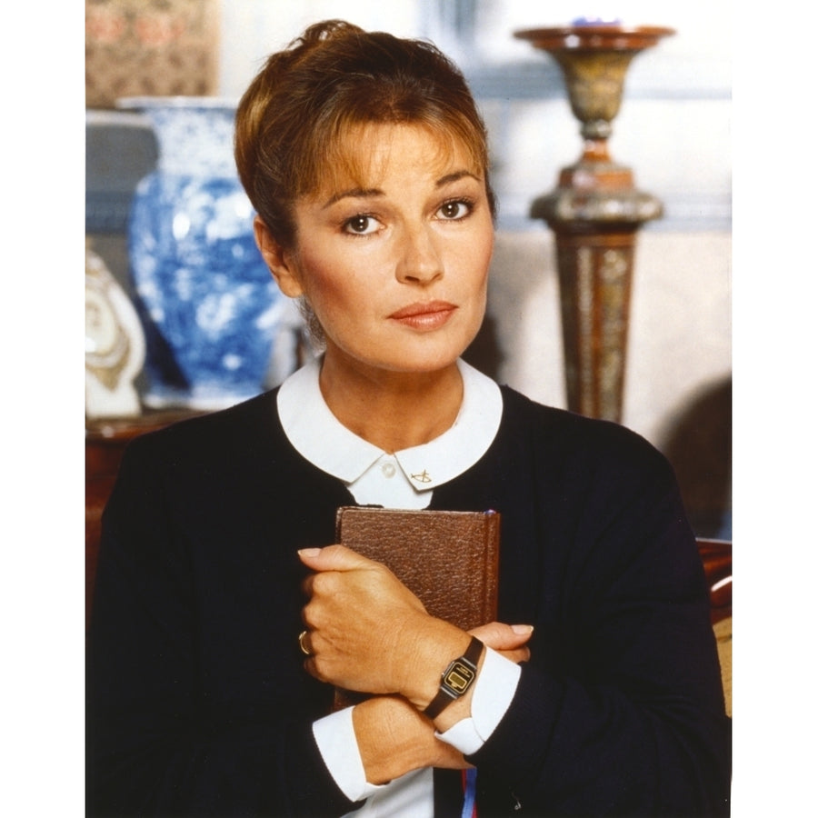 Stephanie Beacham Posed in a Portrait hugging Bible Photo Print Image 1