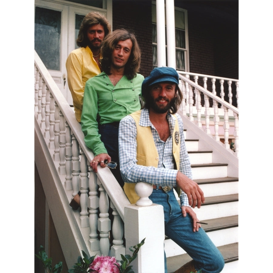 Bee Gees Band Group Picture standing on the White Staircase in Green Yellow and White Long Sleeves Shirts Photo Print Image 1