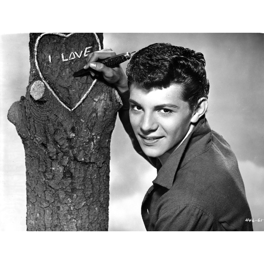 Frankie Avalon carving a love heart in a tree Photo Print Image 1