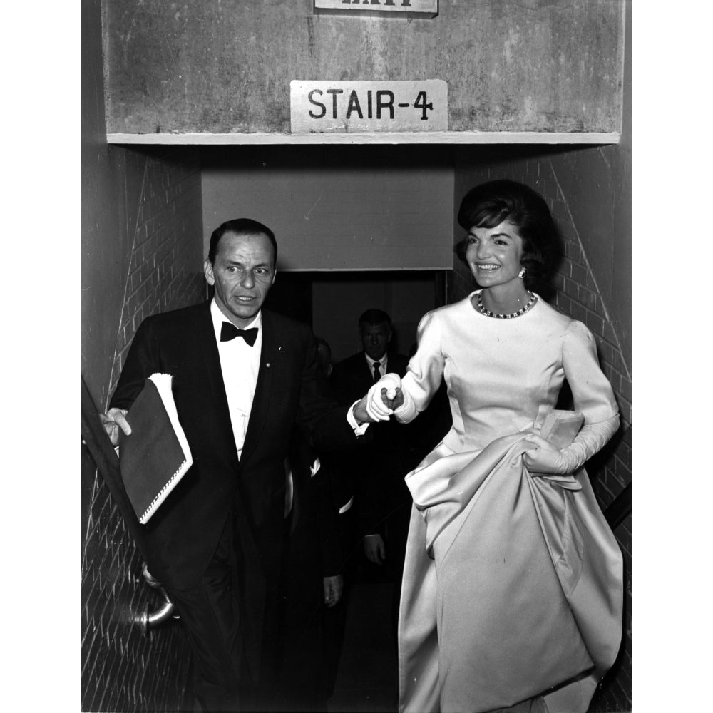 Jackie Onassis walking up stairs with a man Photo Print Image 1