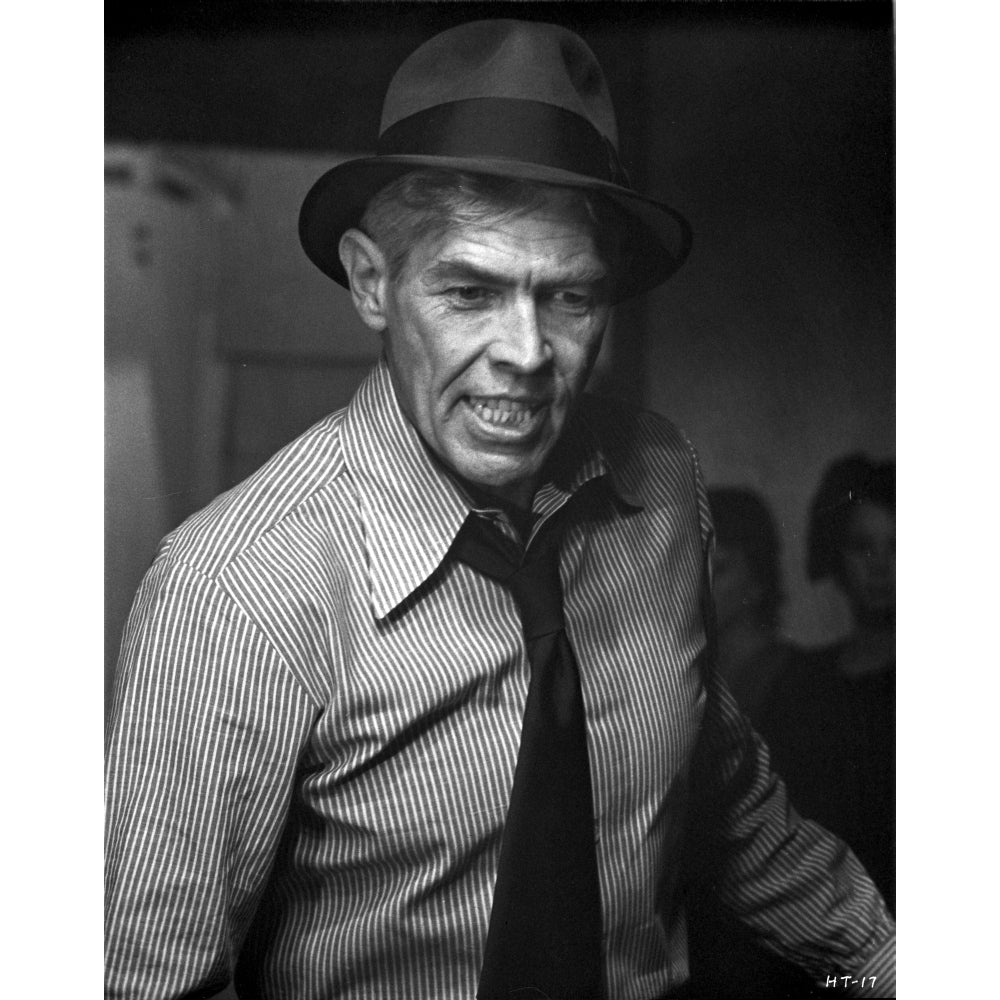 Film still of James Coburn looking angry Photo Print Image 1