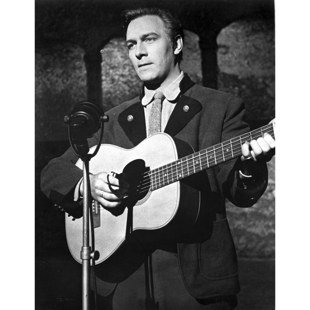 Christopher Plummer playing a guitar on stage Photo Print Image 1