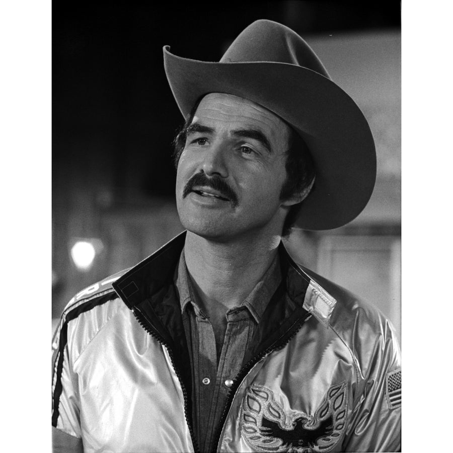 Film still of Burt Reynold wearing a cowboy hat Photo Print Image 1