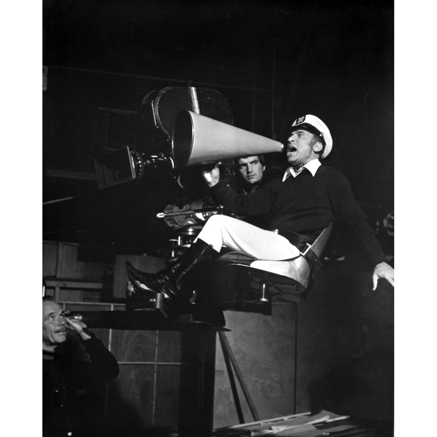 Mel Brooks announcing in navy attire Photo Print Image 1