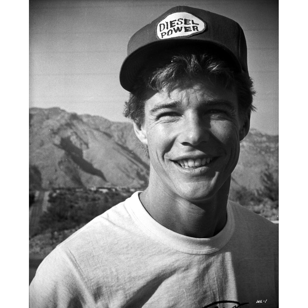 Jan-Michael Vincent wearing a trucker cap Photo Print Image 1