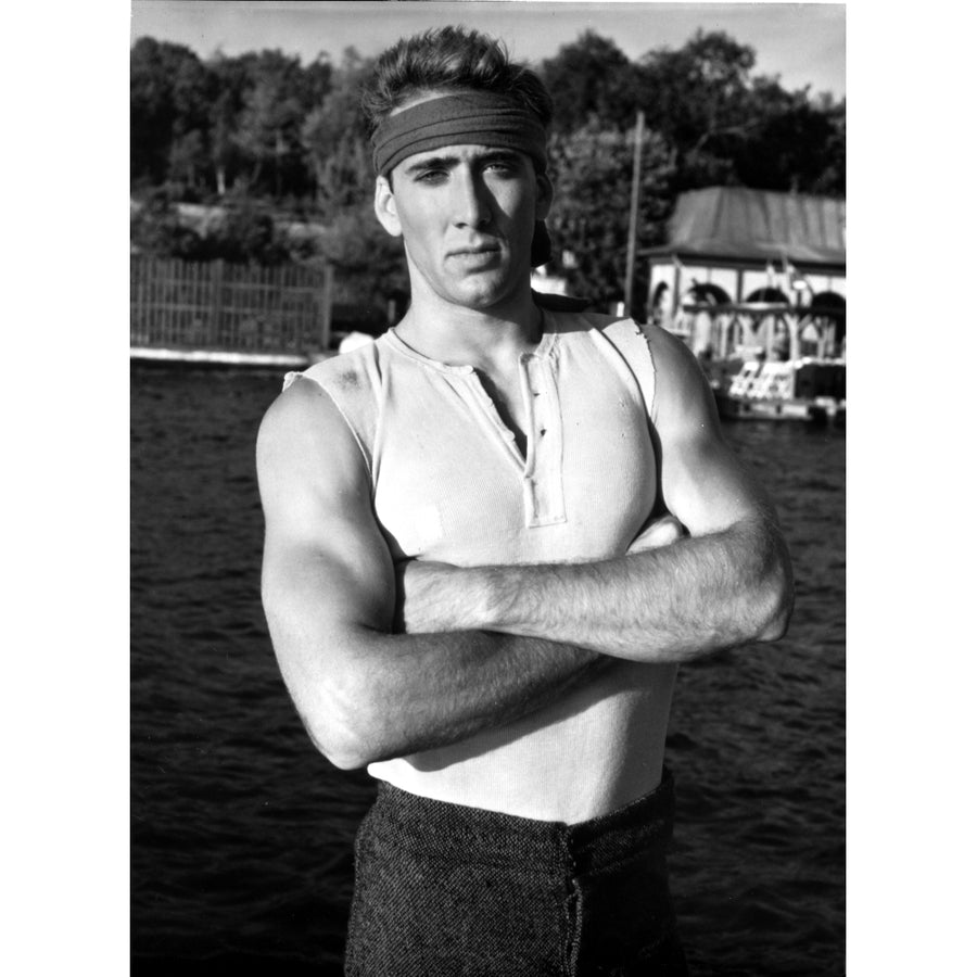 Nicolas Cage wearing sportswear in a field Photo Print Image 1