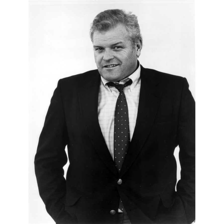 Brian Dennehy wearing a striped tie and a suit Photo Print Image 1