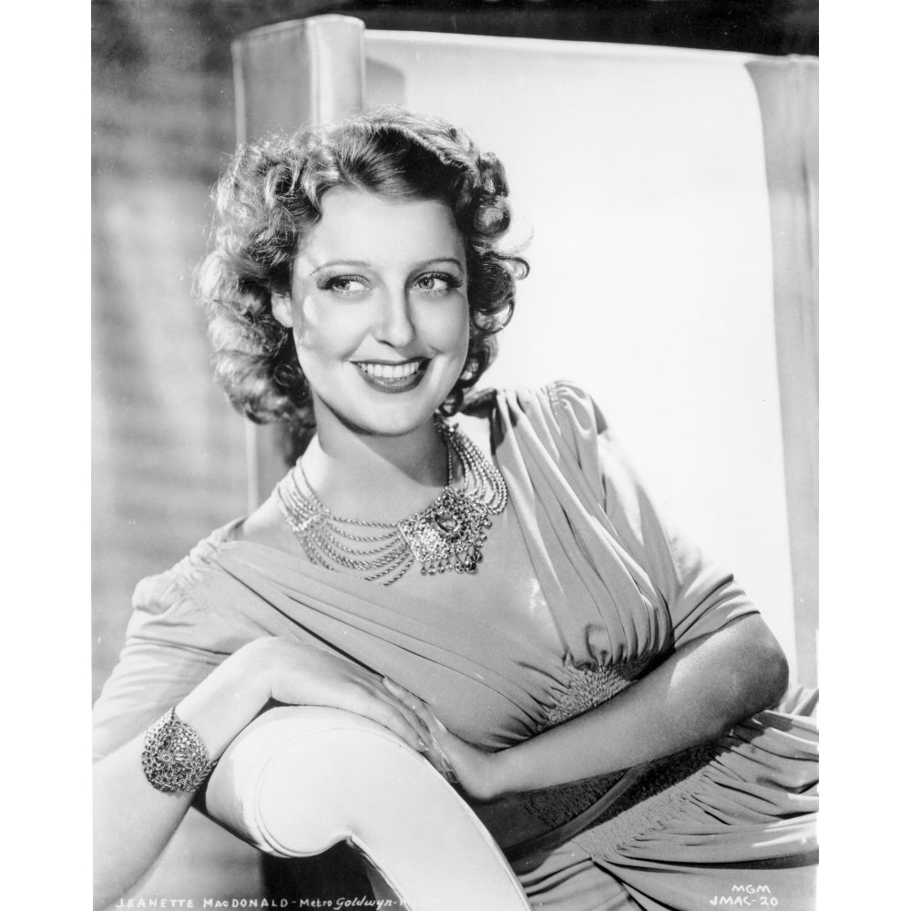 Jeanette MacDonald sitting on a chair Photo Print Image 1