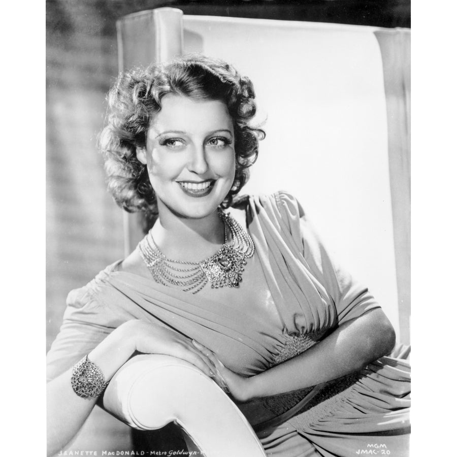 Jeanette MacDonald sitting on a chair Photo Print Image 1