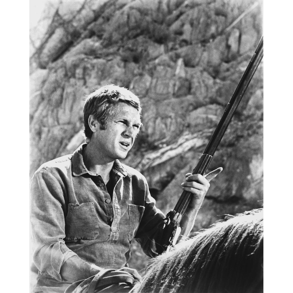 Film still of Steve McQueen with a gun Photo Print Image 1