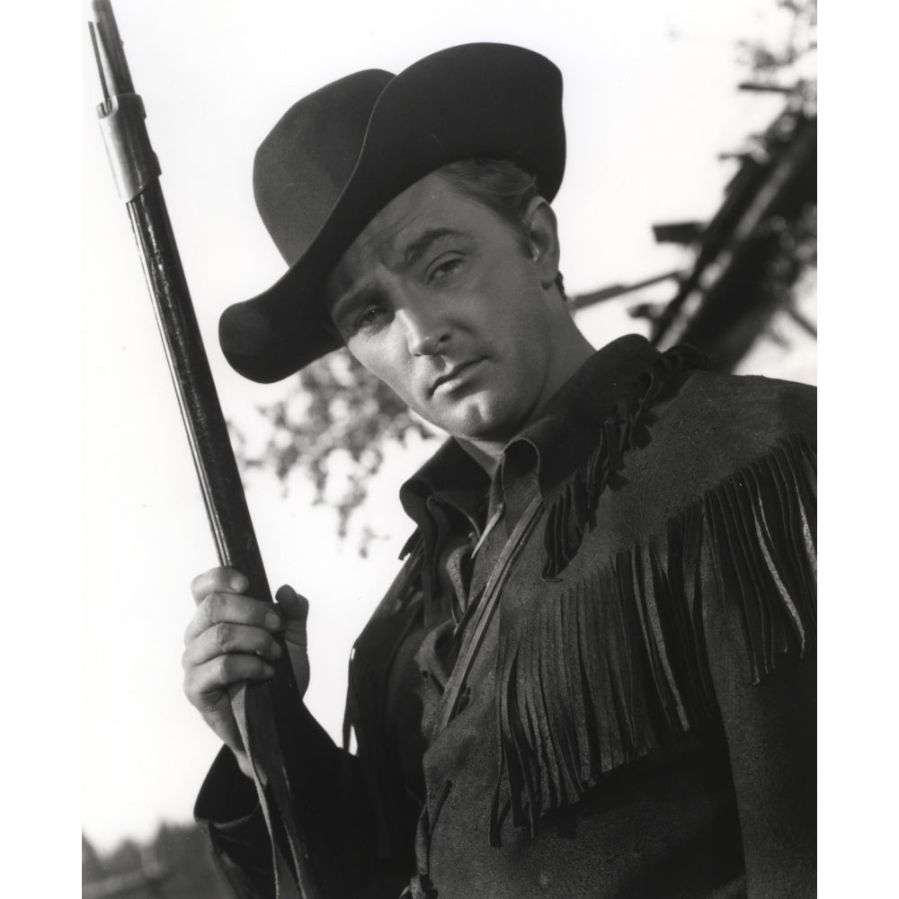 Film still featuring Robert Mitchum as a cowboy Photo Print Image 1