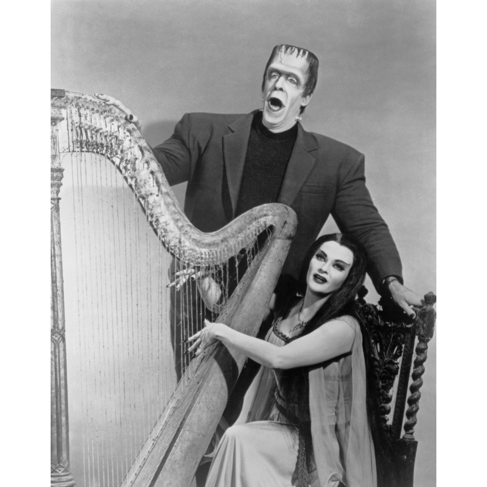 Publicity Still from The Munsters Herman and Lily with Harp Photo Print Image 1