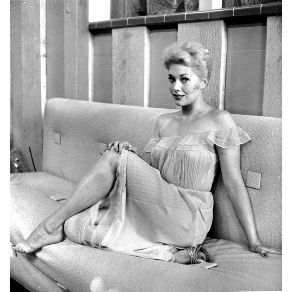 Kim Novak Siting on Bench in White Gown Photo Print Image 1