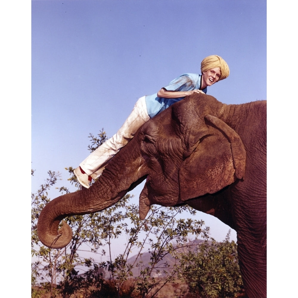 Jay North Riding on Elephant in Blue Short Sleeve Shirt and White Long Pants Photo Print Image 1