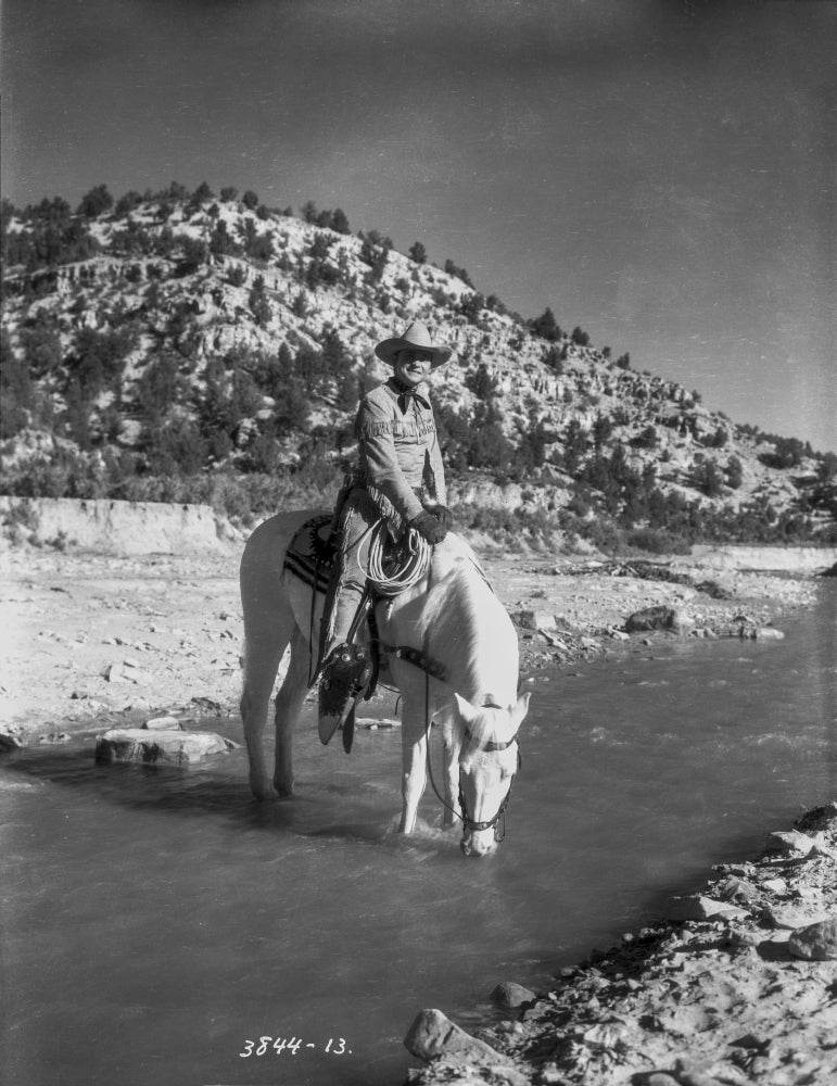 Tex Ritter on horseback in a river Photo Print Image 1